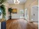 Sun-filled entryway with hardwood floors, large windows, and classic white trim at 3708 Colonel Vanderhorst Cir, Mount Pleasant, SC 29466