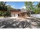 Traditional red brick home with an attached two-car garage and a well-maintained front yard at 3708 Colonel Vanderhorst Cir, Mount Pleasant, SC 29466