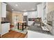 Spacious kitchen features granite countertops, stainless steel appliances, and a center island at 3708 Colonel Vanderhorst Cir, Mount Pleasant, SC 29466
