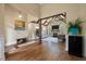Open-concept living area with high ceilings, hardwood floors, and a cozy fireplace, perfect for entertaining at 3708 Colonel Vanderhorst Cir, Mount Pleasant, SC 29466