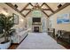 Bright living area showcasing a vaulted ceiling with wooden beams, a fireplace, and modern decor accents at 3708 Colonel Vanderhorst Cir, Mount Pleasant, SC 29466
