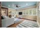 Bright sunroom with blue ceiling, wood floors, and large windows offering abundant natural light at 3708 Colonel Vanderhorst Cir, Mount Pleasant, SC 29466