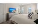 Comfortable bedroom with modern dresser, a view, and ample natural light at 384 Ripple Park Dr, Summerville, SC 29486