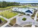 An aerial shot of the community center, pool, lake, walkways, and greenery at 384 Ripple Park Dr, Summerville, SC 29486