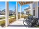 Cozy front porch with seating and scenic neighborhood views at 384 Ripple Park Dr, Summerville, SC 29486