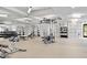 Spacious gym equipped with weight machines, free weights, and mirrored walls at 384 Ripple Park Dr, Summerville, SC 29486