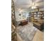 Spacious bedroom featuring ceiling fans, decor shelves and a cozy sitting area at 4113 Buccaneer Rd, Isle of Palms, SC 29451