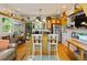 Bright and inviting kitchen featuring an island, stainless steel appliances, and ample natural light at 4113 Buccaneer Rd, Isle of Palms, SC 29451