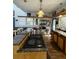 Bright kitchen featuring stainless steel appliances, granite countertops, and hardwood floors at 4113 Buccaneer Rd, Isle of Palms, SC 29451