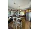 Bright and inviting kitchen featuring an island, stainless steel appliances, and ample natural light at 4113 Buccaneer Rd, Isle of Palms, SC 29451