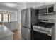 Well-appointed kitchen featuring stainless steel appliances and abundant cabinet space at 4701 Ivydale Dr, North Charleston, SC 29405