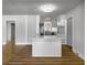 Bright open kitchen featuring an island, stainless appliances, and light gray cabinets at 4701 Ivydale Dr, North Charleston, SC 29405
