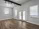 Bright and spacious living room with hardwood flooring and plenty of natural light at 4701 Ivydale Dr, North Charleston, SC 29405