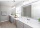 Bright bathroom with gray vanity, double sinks, modern fixtures and plenty of natural light at 505 Kilarney Rd, Summerville, SC 29483