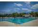 Large swimming pool with clear blue water and plenty of seating for residents at 505 Kilarney Rd, Summerville, SC 29483