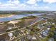 Breathtaking aerial view featuring a waterfront community with bridges and waterways, perfect for those seeking coastal living at 545 Two Mile Run, Johns Island, SC 29455