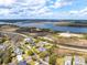 Scenic aerial view featuring waterfront homes surrounded by lush greenery and serene water views in a charming neighborhood at 545 Two Mile Run, Johns Island, SC 29455