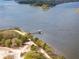 Beautiful aerial view of the waterfront, showing a dock and the surrounding natural landscape at 545 Two Mile Run, Johns Island, SC 29455