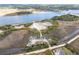 Expansive aerial view showcasing a waterfront boat yard surrounded by lush greenery and tranquil waters for boating enthusiasts at 545 Two Mile Run, Johns Island, SC 29455