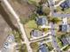 An aerial shot shows the homes backing onto the water and the layout of the surrounding community at 545 Two Mile Run, Johns Island, SC 29455