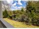Picturesque backyard view overlooking a pond and lush greenery from the balcony at 545 Two Mile Run, Johns Island, SC 29455