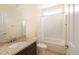 This bathroom features a shower-tub combo with a white shower curtain, sink and toilet at 545 Two Mile Run, Johns Island, SC 29455