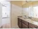 Bright bathroom features a granite countertop, dark wood cabinets and a bedroom with a sitting room at 545 Two Mile Run, Johns Island, SC 29455