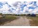 Large boat storage area with multiple boats and trailers under a partly cloudy sky at 545 Two Mile Run, Johns Island, SC 29455