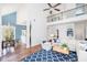 Cozy dining area bathed in natural light, featuring a rustic table set and stylish chandelier at 545 Two Mile Run, Johns Island, SC 29455