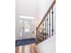 Foyer features a front door with decorative glass, a blue rug, and a stairway at 545 Two Mile Run, Johns Island, SC 29455