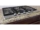 Stainless steel KitchenAid gas cooktop with granite countertops at 545 Two Mile Run, Johns Island, SC 29455