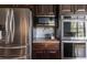 Kitchen showcasing stainless steel refrigerator, microwave, and oven at 545 Two Mile Run, Johns Island, SC 29455