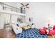 Bright living room with a fireplace, stylish decor and hardwood flooring throughout at 545 Two Mile Run, Johns Island, SC 29455