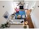 Bright living room featuring an L-shaped couch, fireplace, ceiling fan, hardwood floors, and a decorative blue rug at 545 Two Mile Run, Johns Island, SC 29455