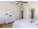 Main bedroom features hardwood floors, a white dresser, and an ensuite bathroom at 545 Two Mile Run, Johns Island, SC 29455