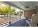 Inviting covered porch with ceiling fan and comfortable seating area, perfect for relaxing outdoors at 545 Two Mile Run, Johns Island, SC 29455