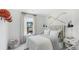 The bedroom features a basketball hoop, hockey sticks, and neutral decor, making it perfect for sports enthusiasts at 584 Red Monarch Way, Moncks Corner, SC 29461