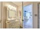 Charming bathroom boasts a decorative vanity with vessel sink, view to sitting area, and modern fixtures at 633 Schooner Rd, Charleston, SC 29412