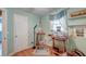 Bright bedroom features hardwood floors and plenty of natural light at 633 Schooner Rd, Charleston, SC 29412