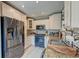 Modern kitchen with white cabinets, stainless steel appliances, and granite countertops at 633 Schooner Rd, Charleston, SC 29412