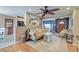 Cozy living room featuring hardwood floors, neutral walls, and decoratively furnished with a ceiling fan at 633 Schooner Rd, Charleston, SC 29412