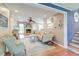Spacious living room featuring hardwood floors, fireplace, and open floor plan design at 633 Schooner Rd, Charleston, SC 29412