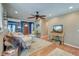 Spacious living room with hardwood floors, a comfortable sofa, and natural light, perfect for Gathering gatherings at 633 Schooner Rd, Charleston, SC 29412