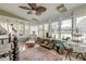 Bright sunroom with lots of windows, and plenty of space for relaxation and enjoying natural light at 633 Schooner Rd, Charleston, SC 29412