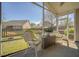 View of the outdoor patio with wicker furniture and privacy fence at 8208 Little Sydneys Way, North Charleston, SC 29406