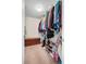 Spacious walk-in closet with ample storage and a wooden storage chest at 8208 Little Sydneys Way, North Charleston, SC 29406