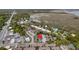 Scenic aerial view of a condo community with lush trees near a waterway and commercial area at 874 Colony Drive # B19, Charleston, SC 29407