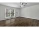 Large living area featuring hardwood floors and a large window at 874 Colony Drive # B19, Charleston, SC 29407