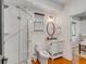 Bathroom featuring a glass shower, toilet, and vanity with sink at 90 Spring St # Ab, Charleston, SC 29403