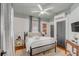 Comfortable bedroom featuring a ceiling fan, area rug, and stylish decor at 90 Spring St # Ab, Charleston, SC 29403